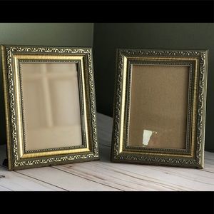 Two 5”X7” golden picture frames